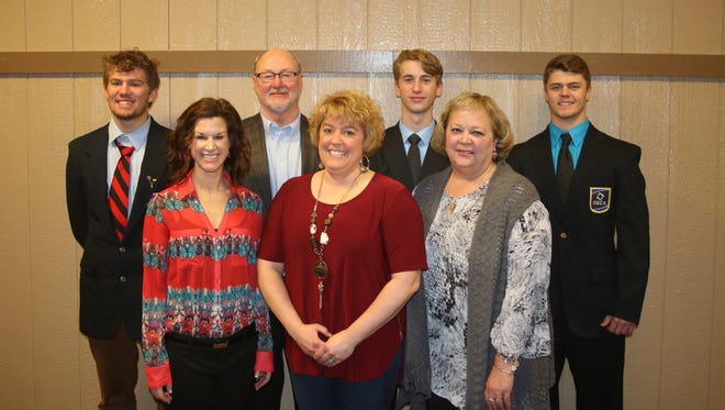 Oak Harbor Award Winners and DECA members are, in front left to right, Erin Flowers, Becci Petersen, and Ann King. In the back row are Konnor Fletcher, George St. Bonore, Owen Segaard and Jeff Winterfield.
