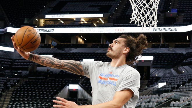 Steven Adams of the Oklahoma City Thunder goes though drills before an April 30 game in San Antonio, Texas.