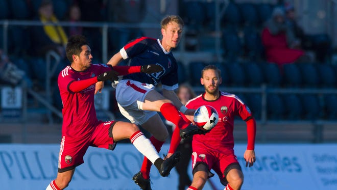 FILE -- Indy Eleven midfielder Brad Ring (4) works to gain control of the ball. The Indy Eleven opened their 2016 season against Ottawa Fury Saturday, April 9, 2016, at IUPUI's Michael A. Carroll Track and Soccer Stadium. The game ended in a 1-1 draw.