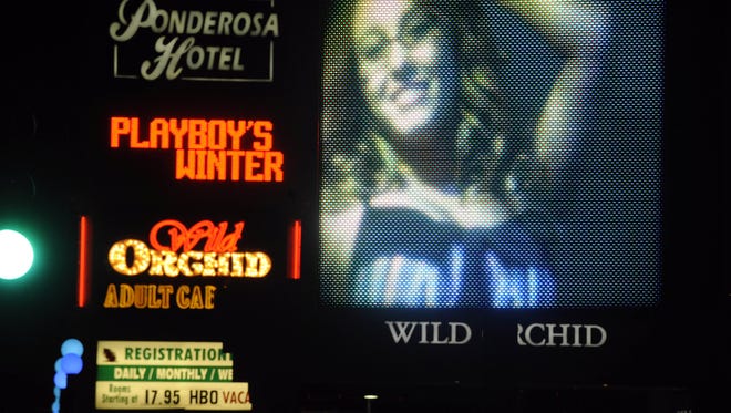 The video sign outside the Wild Orchid gentleman's club at the north end of Reno's Midtown is one of the area's most criticized digital signs.