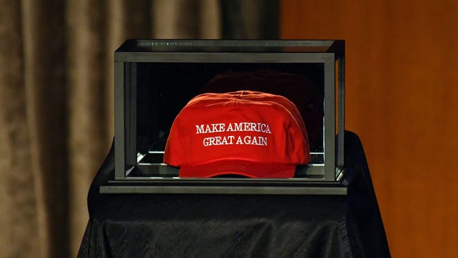 Nov 8, 2016; New York, NY, USA;   A Make America Great Again hat is placed on the side of the stage prior to Republican Party candidate Donald Trump speaking to supporters at New York Hilton Midtown on election night.  Mandatory Credit: Robert Deutsch-USA TODAY NETWORK ORG XMIT: USATSI-353736 ORIG FILE ID:  20161108_ajw_usa_092.jpg