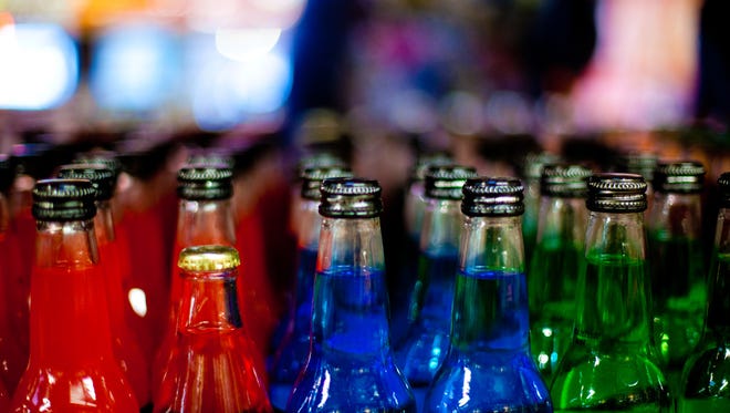 Rows of colorful sodas in a Rocket Fizz location.