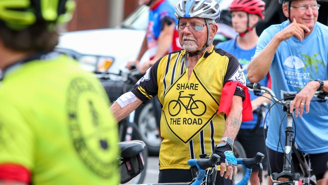 Donald Boose, 88, of Pensacola, prepares for the start of the annual Ride of Silence, coordinated locally by West Florida Wheelmen, on Wednesday, May 16, 2018. Held in hundreds of locations internationally on the 3rd Wednesday of May each year, the event aims to honor cyclists who have been injured or killed and to raise awareness that cyclists and vehicles share the road.