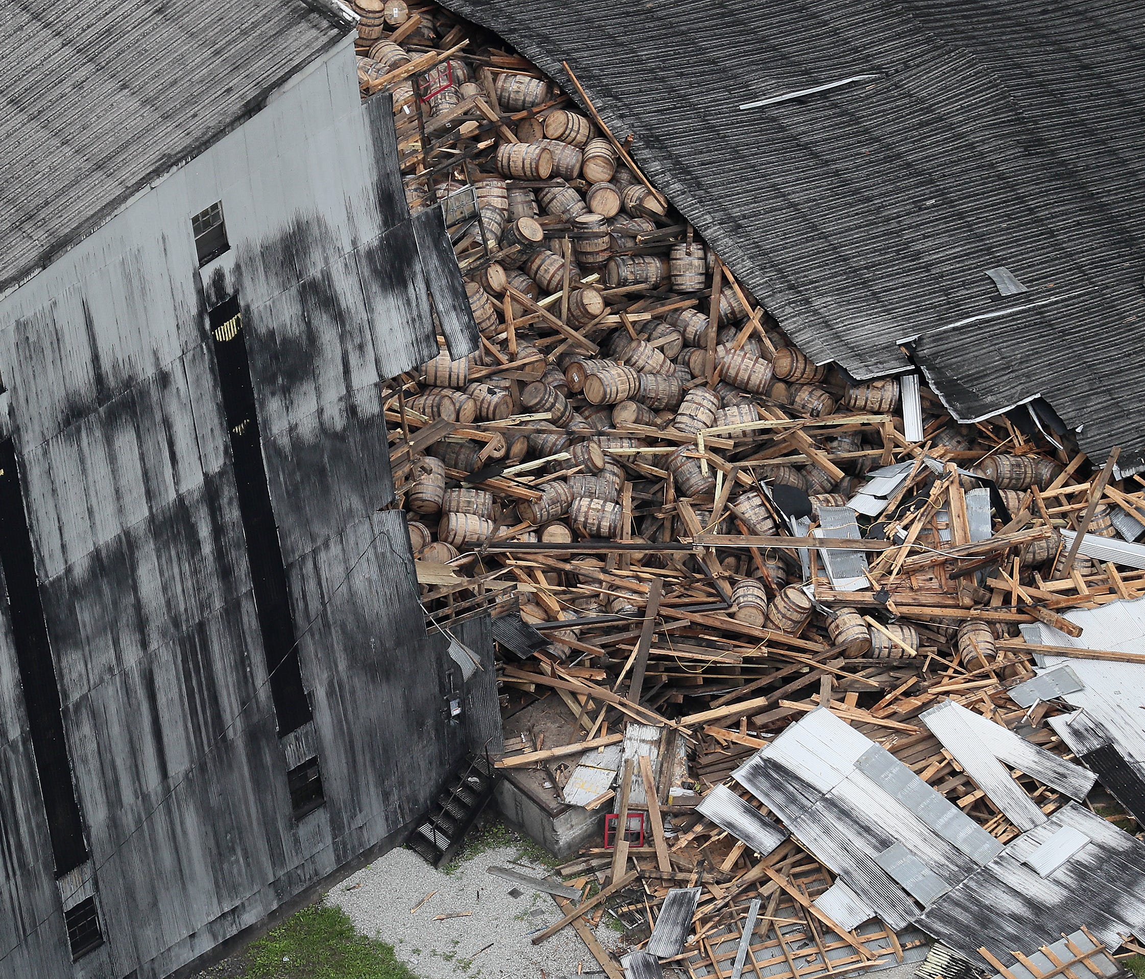 A partially-collapsed bourbon warehouse at the Barton 1792 distillery in Bardstown, Kentucky.  June 23, 2018