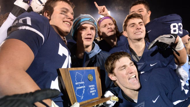 Shawnee celebrates after defeating Hammonton 41-6 in the South Jersey Group 4 final on Sunday.