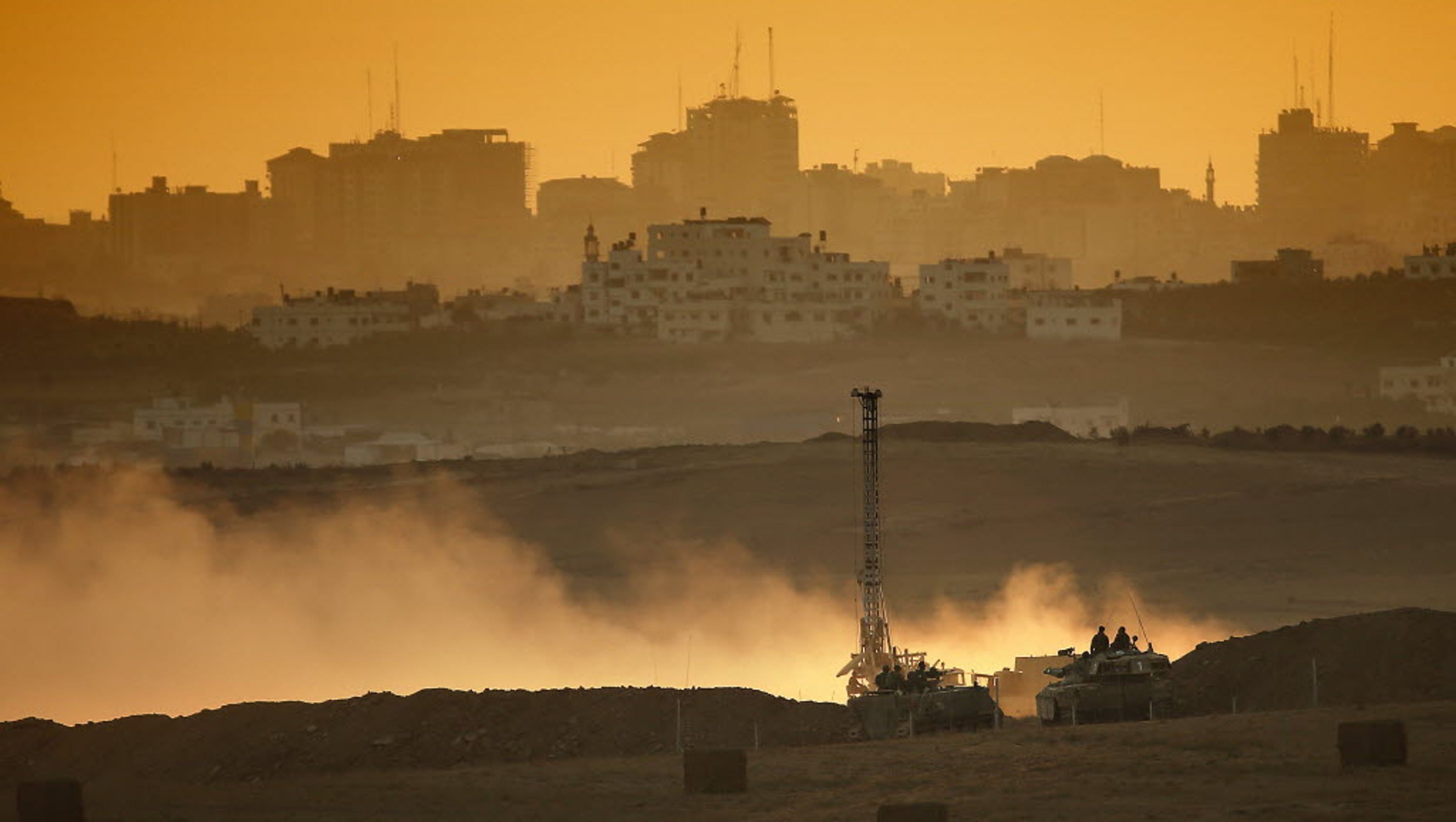 Israel says all troops will leave Gaza; ceasefire begins