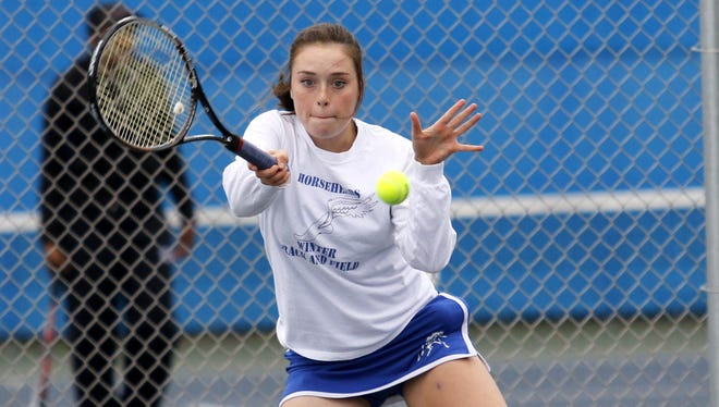Meredith Braiman of Horseheads returns a ball to against Corning earlier this season. Braiman repeated as Section 4 singles champion Saturday.