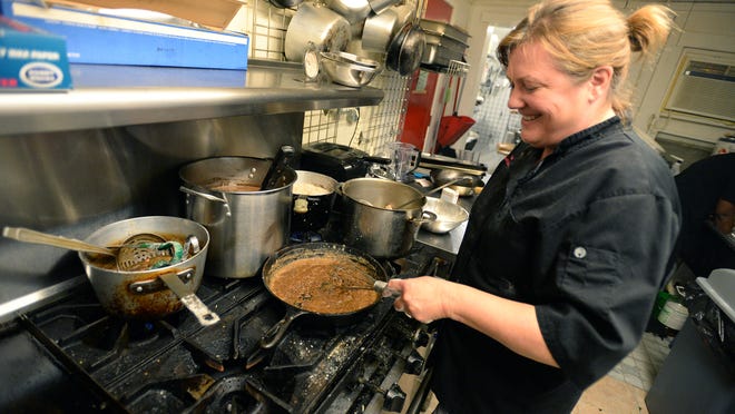 Carolyn Manning creates a rue while cooking a batch of gumbo. Manning owns Blue Southern Comfort Foods catering and cooking school where she teaches others to make her gumbo.