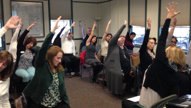 The Be a Business Maker Conference on March 24 at the Warren branch of the Somerset County Library System of New Jersey included a workshop that showed how participants can do simple yoga exercises at their work desk.