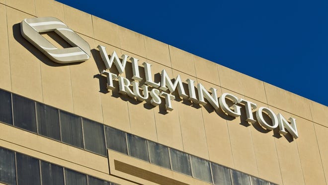 The Wilmington Trust building in Wilmington is shown.