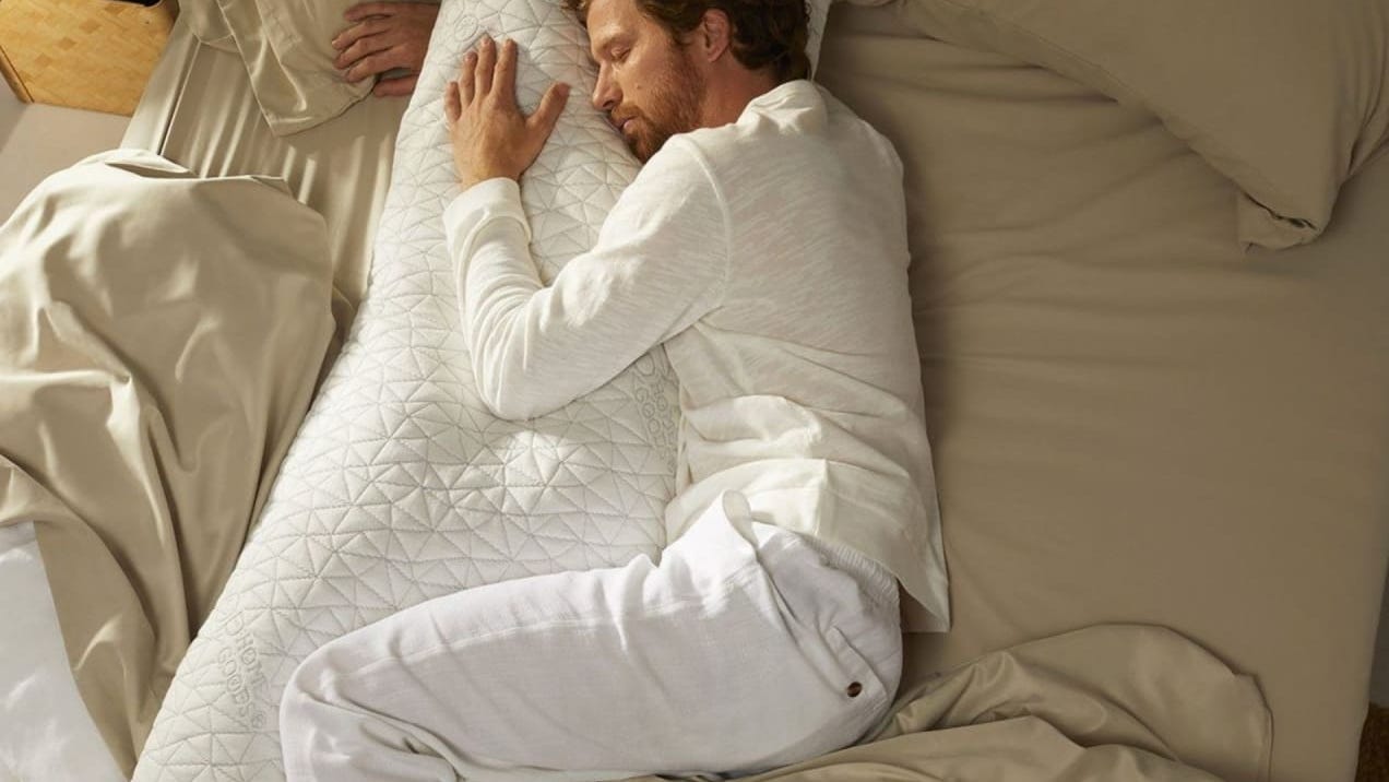 What is a body pillow? And how can you use one to improve sleep?