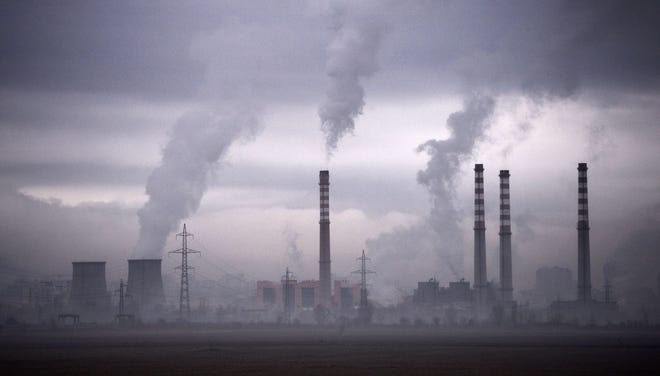 Smoke rises from stacks of a thermal power station in Sofia, Bulgaria.