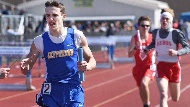 Jefferson's Nolan Vanover finishes the final leg of the 3,200-meter relay at the 2019  Jefferson Invitational.