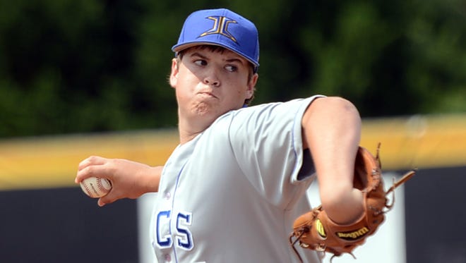 Jackson Christian's Nick Jackson winds back for a pitch during game one of their doubleheader against Goodpasture Christian School on Thursday, May 22, 2014.