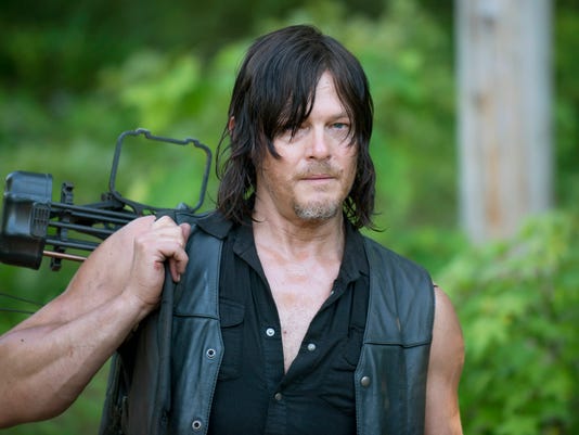 the walking dead tortures daryl introduces hit song