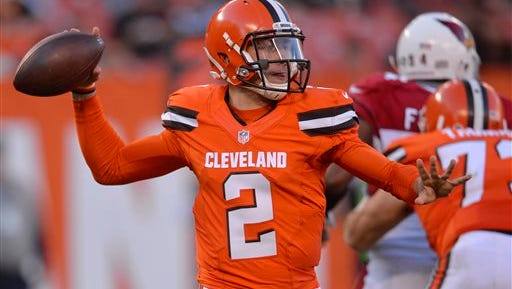Cleveland Browns quarterback Johnny Manziel passes in the second half of an NFL football game against the Arizona Cardinals, Sunday, Nov. 1, 2015, in Cleveland. (AP Photo/David Richard)