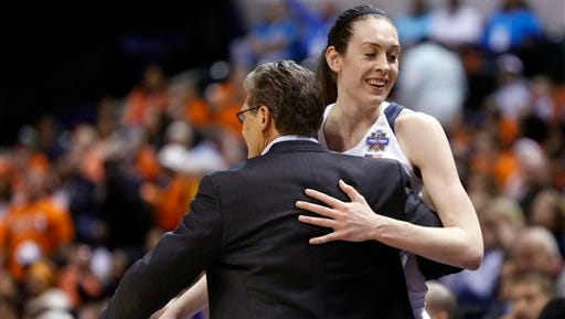 Connecticut's Breanna Stewart (30) is greeted by head coach Geno Auriemma as she is taken out of the game during the second half of a national semifinal game against Oregon State, at the women's Final Four in the NCAA college basketball tournament Sunday, April 3, 2016, in Indianapolis. Connecticut won 80-51.  (AP Photo/AJ Mast)