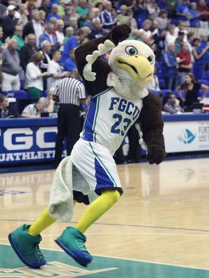 FGCU's mascott Azul runs around the court while pumping up the crow for a women's basketball game between FGCU and Lipscomb.