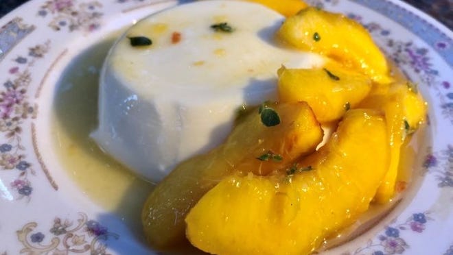 Peaches with thyme are a lovely topping for panna cotta, but strawberries with basil or any other soft fruit and herb combination would also be delicious.