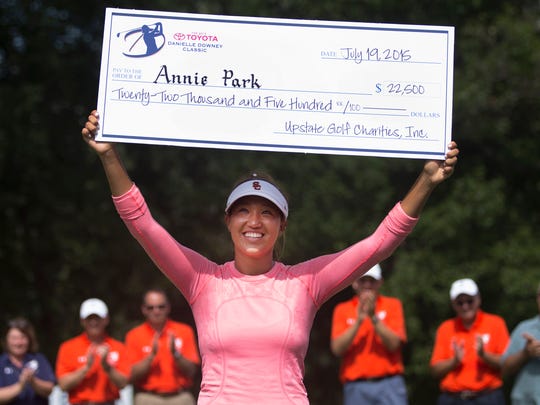 Annie Park holds the Symetra Tour's Toyota Danielle Downey Classic check at Brook-Lea Country Club after winning the inaugural event in 2015. A three-year extension was announced Wednesday.