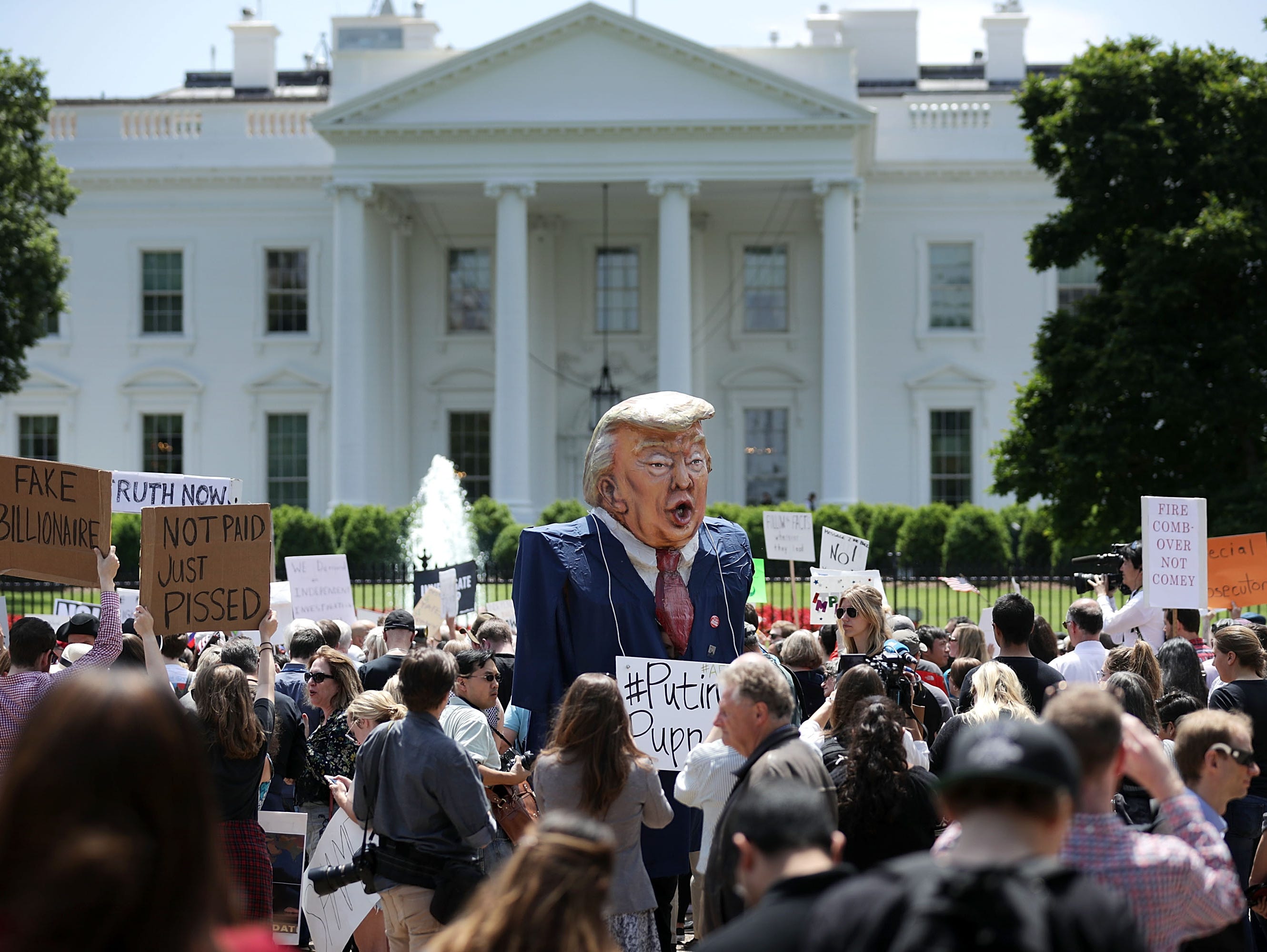 Protesters at the White House on May 10, 2017.