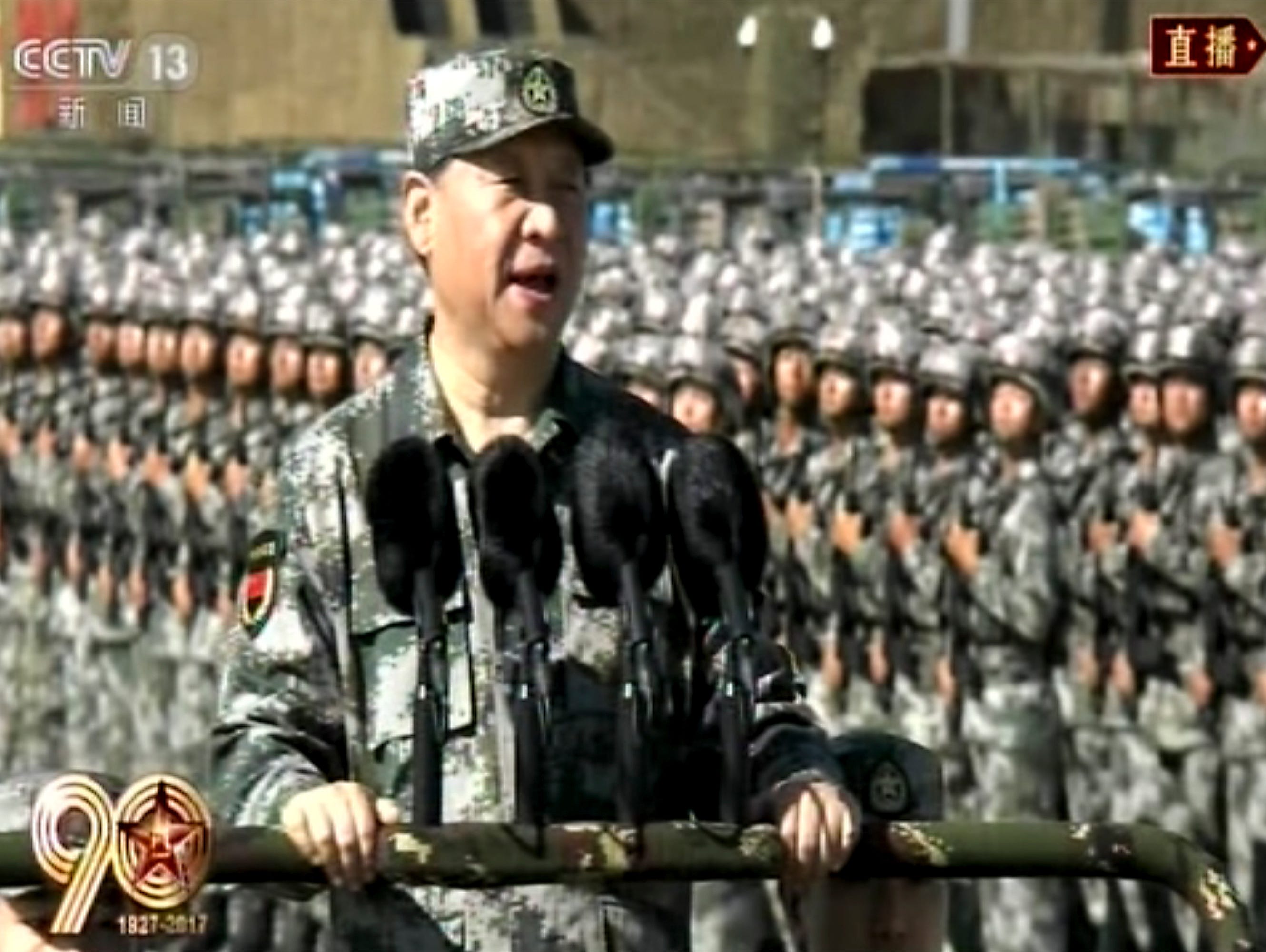In this image taken from video, Chinese President Xi Jinping inspects troops of the People's Liberation Army (PLA) Sunday, July 30, 2017 during a military parade to commemorate the 90th anniversary of the founding of the PLA on Aug. 1 at Zhurihe trai