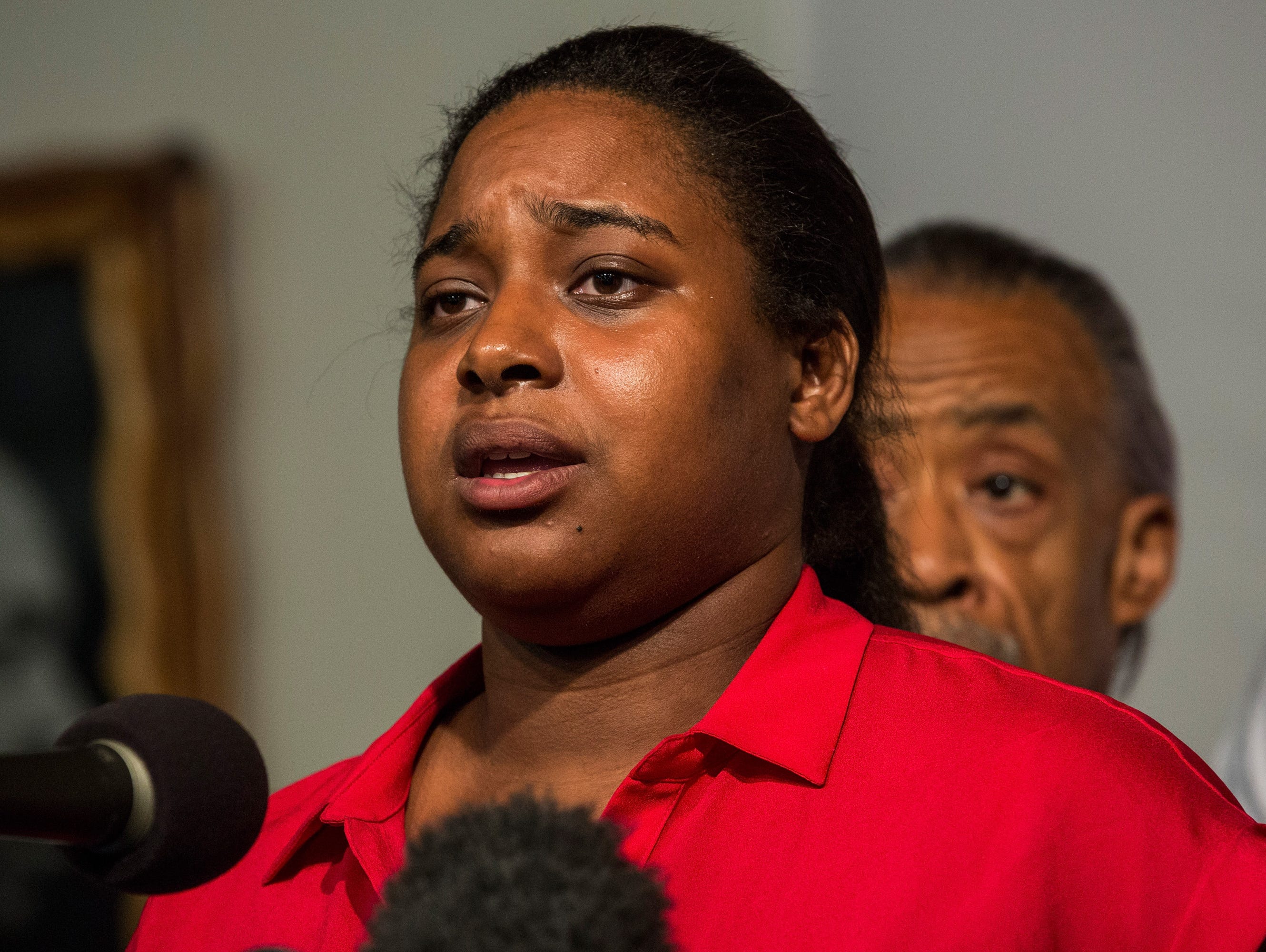Erica Garner, 27, shownina file photo, ws hospitalized on Christmas Eve following a heart attack. The activist became an critic of police brutality following the death of her father, Eric Garner, in 2014, as he was being arrested on Staten Island on 