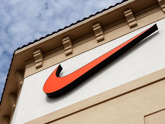 The  "Swoosh" logo is seen on a Nike factory store