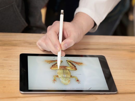 The new 9.7-inch iPad is used to demonstrate the dissecting