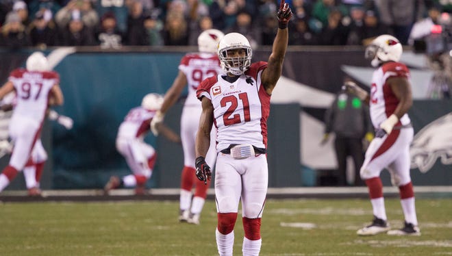 Cardinals cornerback Patrick Peterson (21) reacts after strong safety Deone Bucannon (not pictured) intercepts a ball for a touchdown against the Philadelphia Eagles during the second half at Lincoln Financial Field. The Cardinals won 40-17.