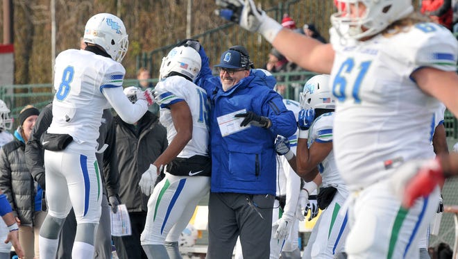 UWF football coach Pete Shinnick celebrates on the sideline at the end of Saturday's 27-17 win over Indiana (Pa.) in the NCAA Division II semifinals in Indiana, Pennsylvania.