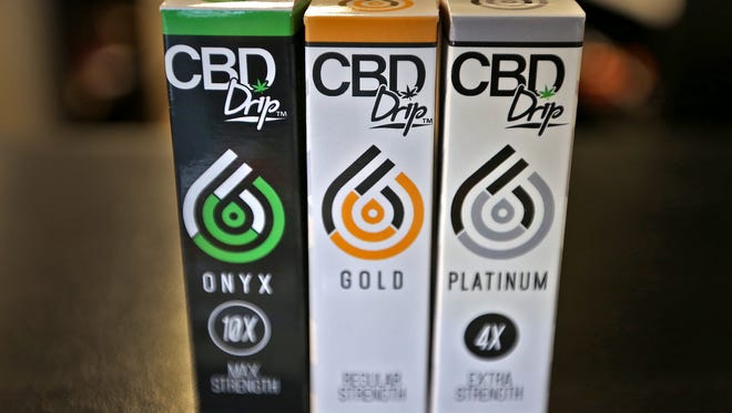 This is one of the CBD products for sale at Hoosier Vapor in Plainfield, seen Thursday, Nov. 30, 2017.  The store, which sells CBD oil products will likely pull the products in accordance with an order from the governor. Tiffany Jones, whose family owns the stores, has started an online petition in protest of that decision and has garnered more than 21,000 signatures in eight days. For now, they have all the products on clearance at their stores.