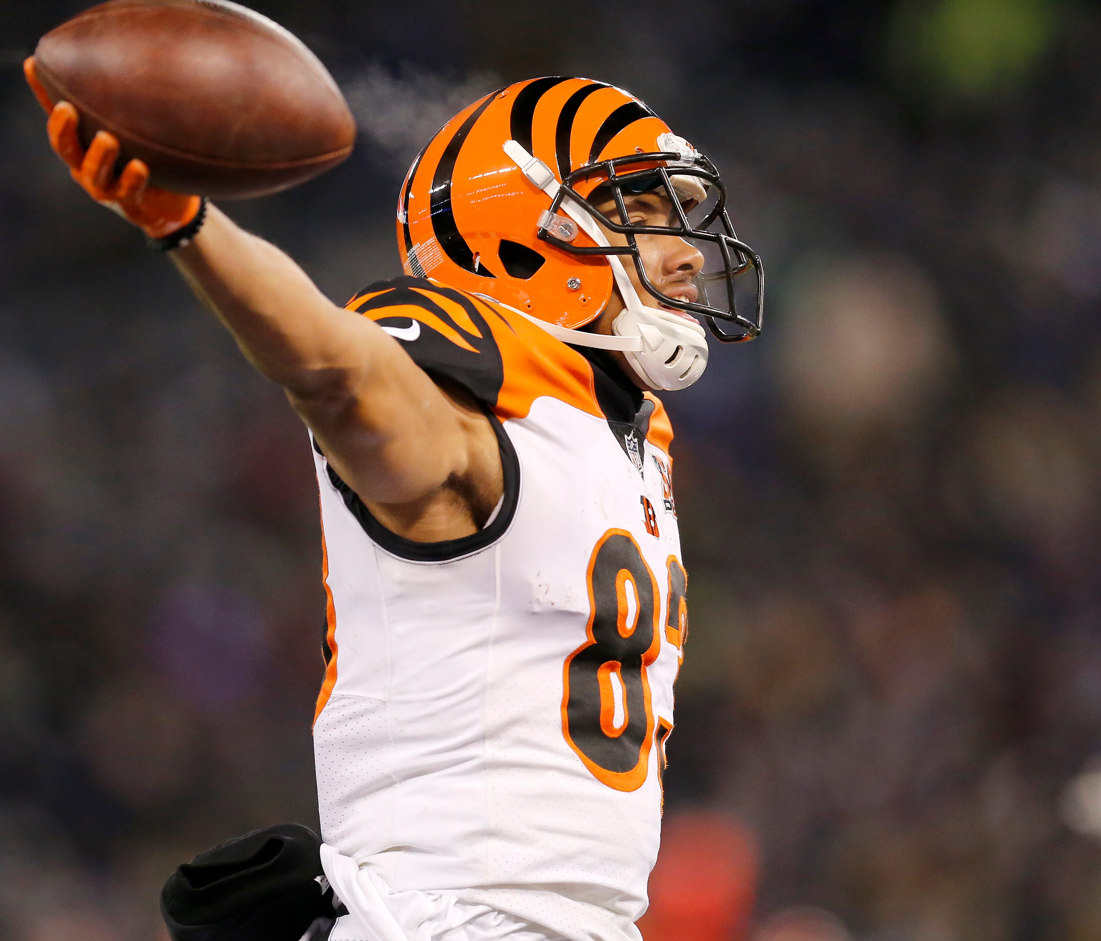 Cincinnati Bengals wide receiver Tyler Boyd (83) throws his hands up as he crosses into the end zone for a game winning touchdown in the fourth quarter of the NFL Week 17 game between the Baltimore Ravens and the Cincinnati Bengals at M&T Bank Stadiu