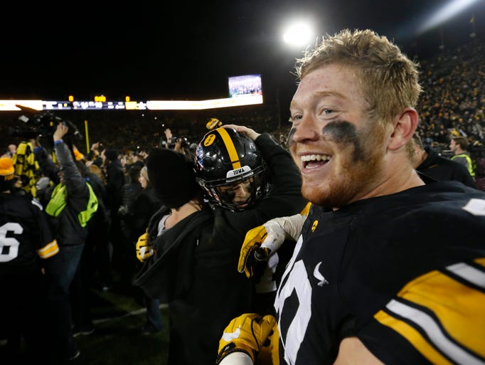 Players and fans celebrate Saturday, Nov. 12, 2016,