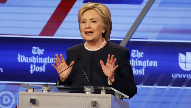 In this photo taken March 9, 2016, Democratic presidential candidate, Hillary Clinton speaks during the Democratic presidential debate in Miami, Fla.