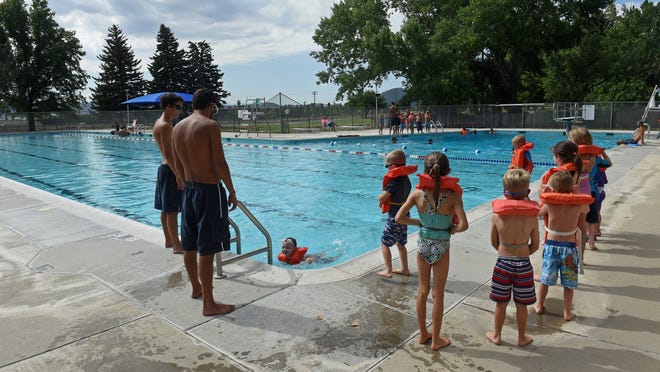 Children take swimming lessons at Bowers Mansion pool in 2014. The pool has undergone a series of upgrades and will reopen for the season on June 11, 2022.