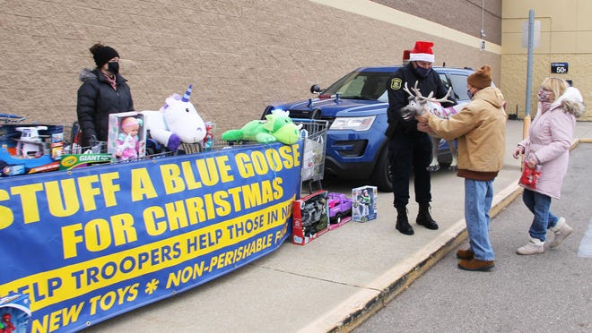 Brian and Robin Dickey of Branch County dropped off several items at "Stuff A Blue Goose," held Saturday at Walmart in Coldwater.