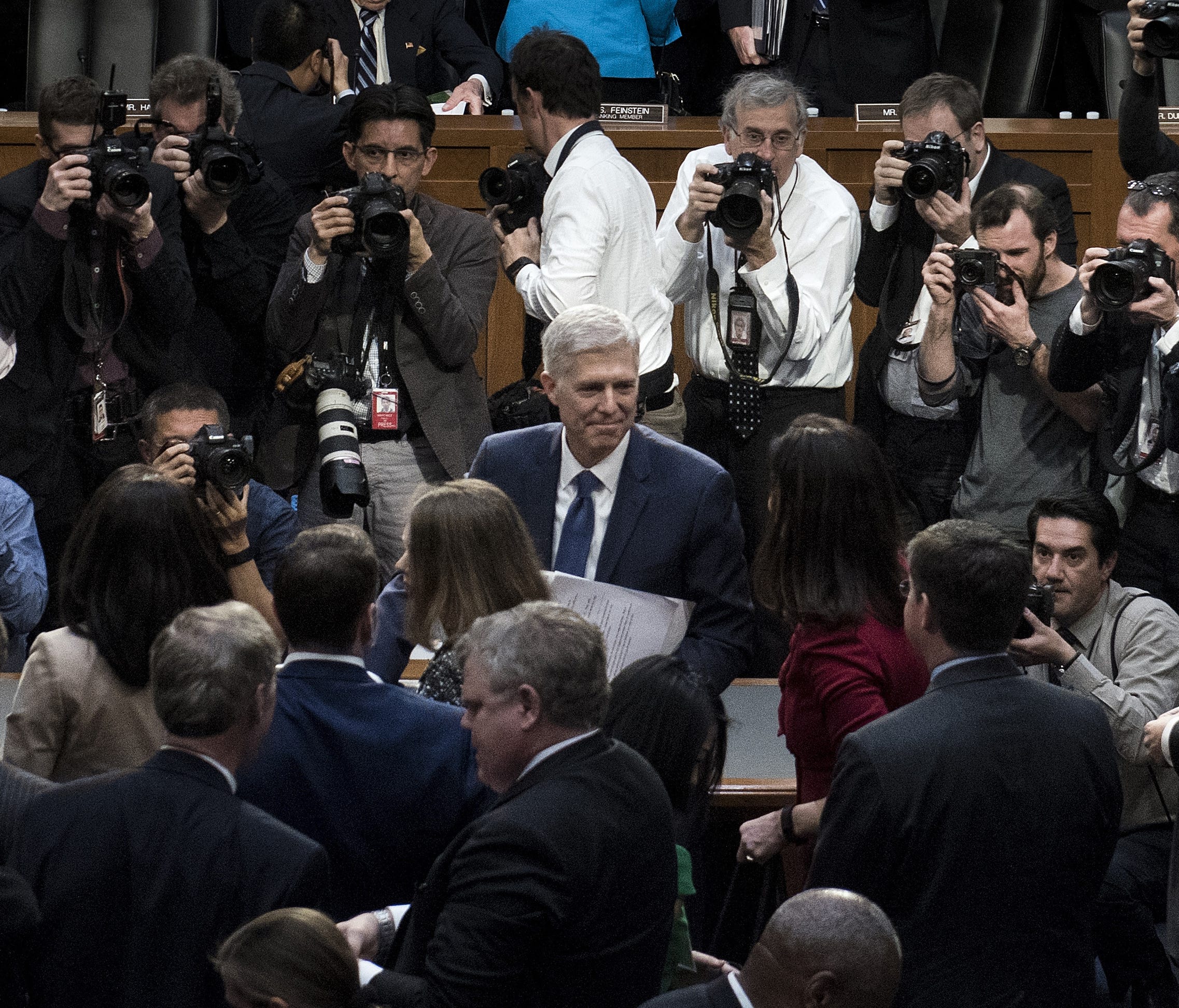 Supreme Court nominee Neil Gorsuch leaves a Senate hearing room on March 20, 2017, after the first day of his confirmation hearing for a seat on the Supreme Court.
