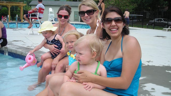 Becky Swann, from left, with daughter Ellen, Lauren Rayment with her daughter Anna Lee and Beth Maslin with daughter Ella Brooks visited the Black Mountain Pool.