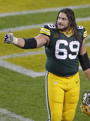 Green Bay Packers tackle David Bakhtiari (69) gestures to the fans after the game against the Kansas City Chiefs at Lambeau Field.