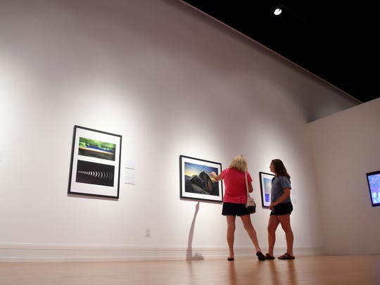 Smithsonian magazine’s 14th annual Museum Day is Saturday at three museums across the Treasure Coast, including the Vero Beach Museum of Art. Gayle LeGore, of Vero Beach, and her granddaughter Olivia Tibbetts, of Suffield, Conn., walk through the Astronomy Photographer of the Year exhibit June 28, 2018.