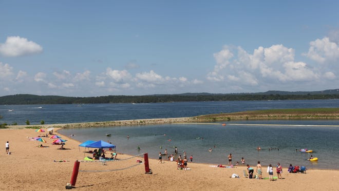 Moonshine Beach near the Table Rock Lake dam has been closed because of high water from heavy summer rains. It reopened Wednesday, after water levels in the lake dropped.