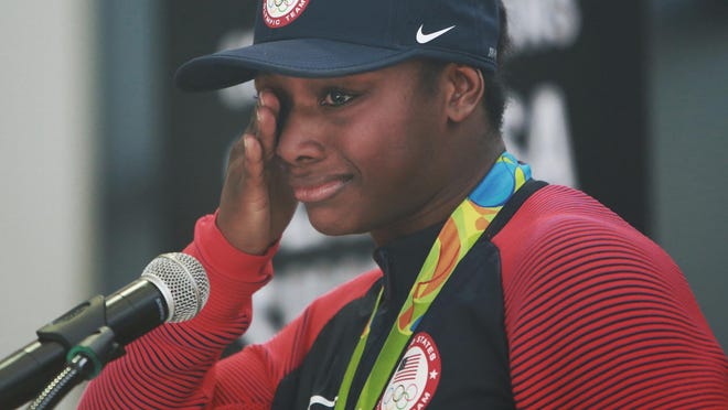 Olympic gold medalist Claressa Shields gets emotional on stage in Flint. “It was not an easy journey,” Shields told the crowd. “I was one of those broken kids. Felt like my life was never gonna get better.” After finding boxing, she found God and hope, she said.