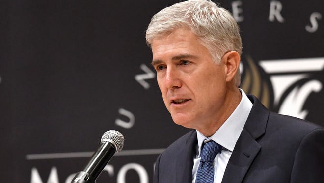 Justice Neil Gorsuch speaks to an audience as a guest of Senator Mitch McConnell, R-Ky., at the University of Louisville, Thursday, Sept. 21, 2017, in Louisville, Ky.