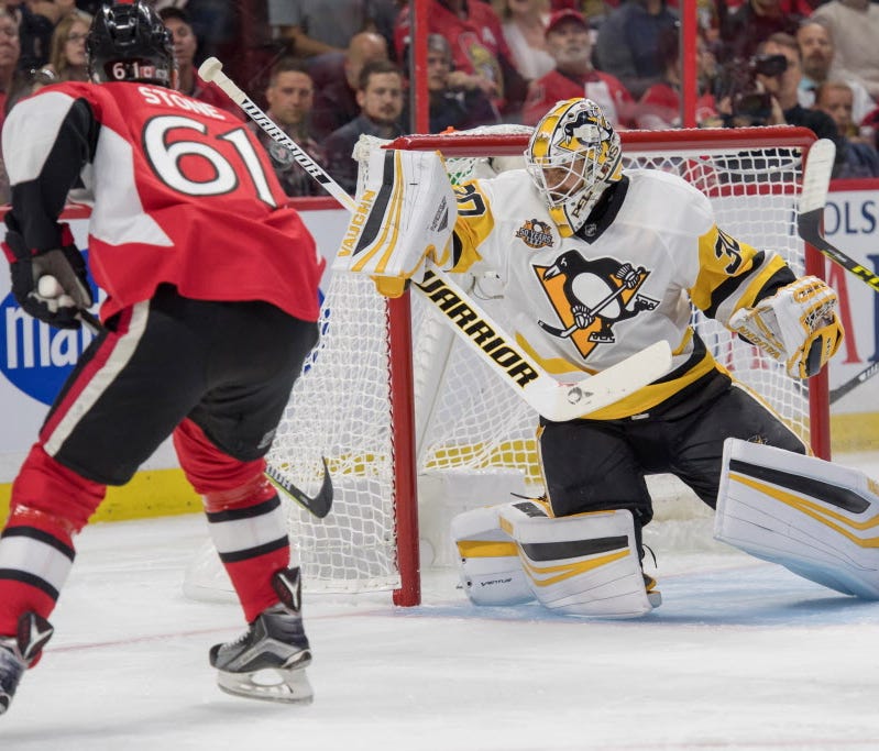 Pittsburgh Penguins goalie Matt Murray (30) makes a save on a shot from Ottawa Senators forward Mark Stone (61) in the second period of Game 4.