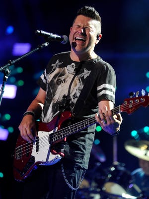 Jay DeMarcus, of Rascal Flatts, performs onstage during the CMA Music Festival at LP Field, Thursday, June 11, 2015, in Nashville, Tenn.