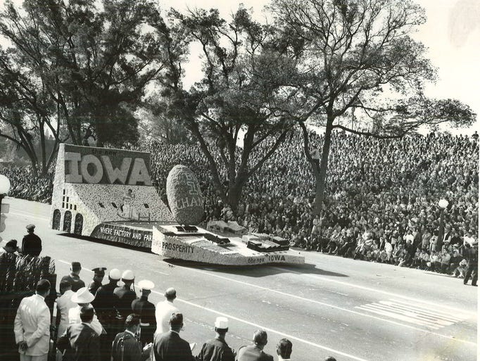 The University of Iowa float moves along the route