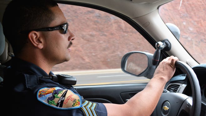 Sgt. Brian Zach, with the Kingman Police Department in northwest Arizona patrols the streets Nov. 17, 2017. While figures show pain pill prescriptions in Arizona dropped nearly 10 percent over the last decade — 70.2 opioid prescriptions per 100 people — they have continued to rise in Mohave County and rural communities, like Kingman.