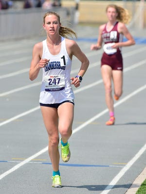 Abby Yourkavitch of Chambersburg takes the lead in the 3200m run. Mid Penn Track & Field Championships were held Saturday, May 12, 2018 at Chambersburg's Trojan Stadium.