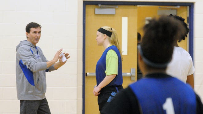 Sussex Central girls basketball coach Ron Dukes talks to his team during practice.